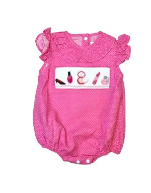 Pink polka dots make up theme smocked girl bubble.